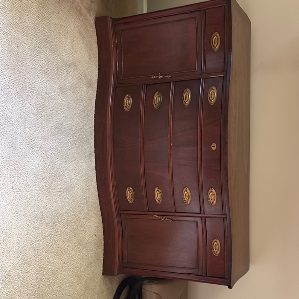 Elegant Wooden Dresser with Gold Accents